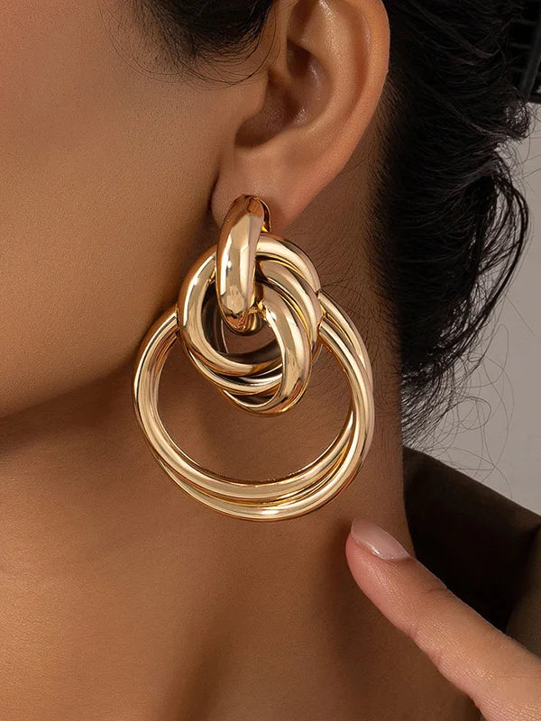 Boucles d'oreilles en or entrelacées