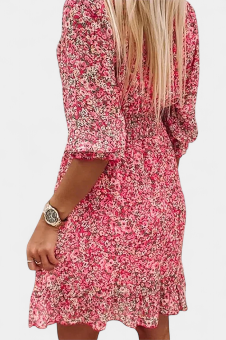 Robe Florale Benicia à Manches Bouffantes avec Ourlet Joueur