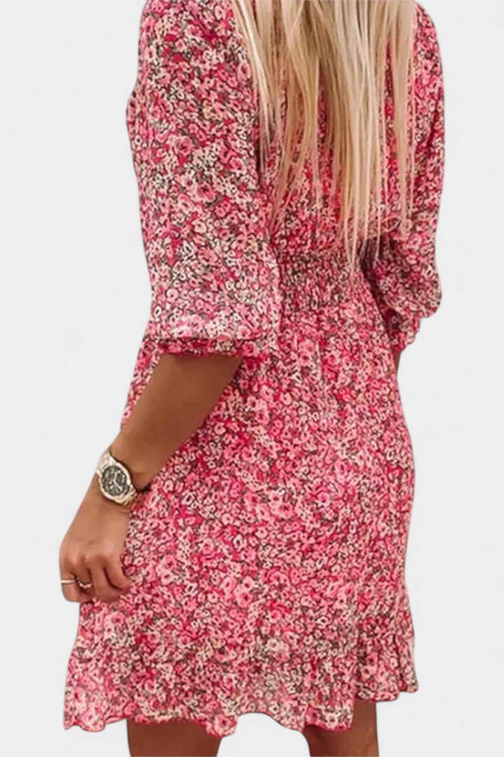 Robe Florale Benicia à Manches Bouffantes avec Ourlet Joueur