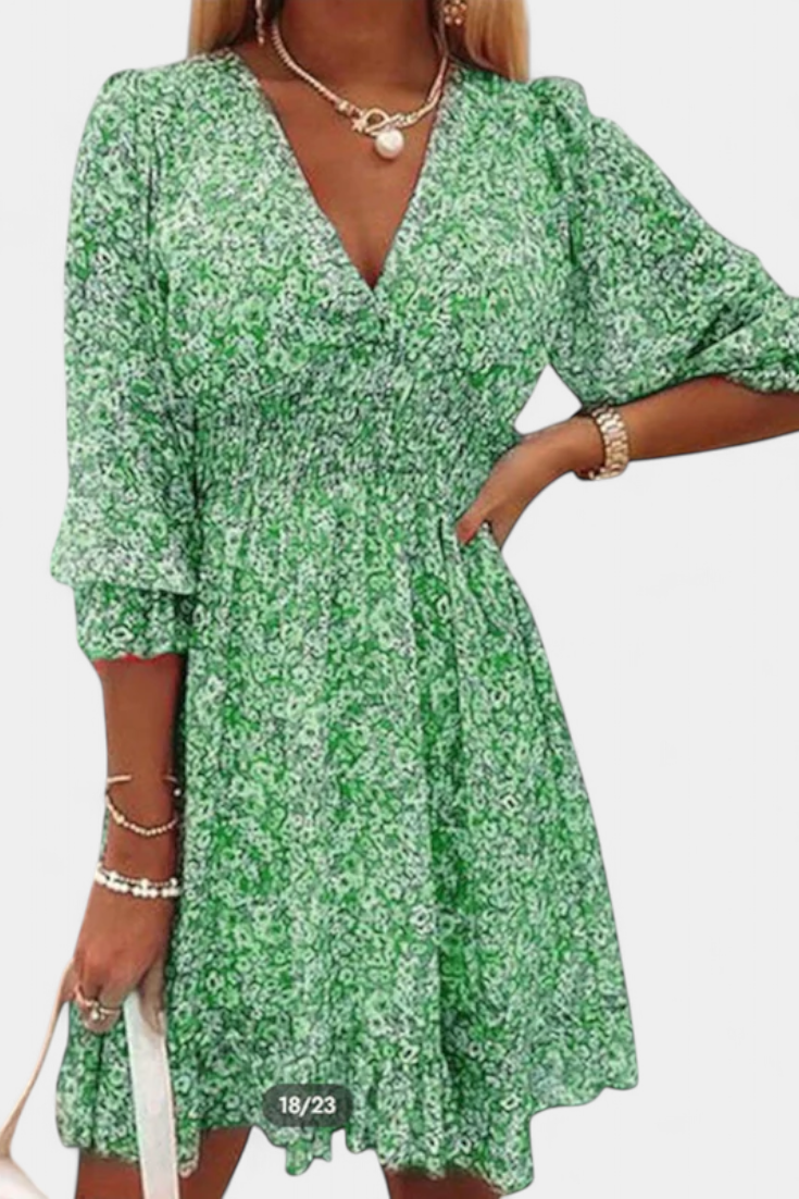 Robe Florale Benicia à Manches Bouffantes avec Ourlet Joueur