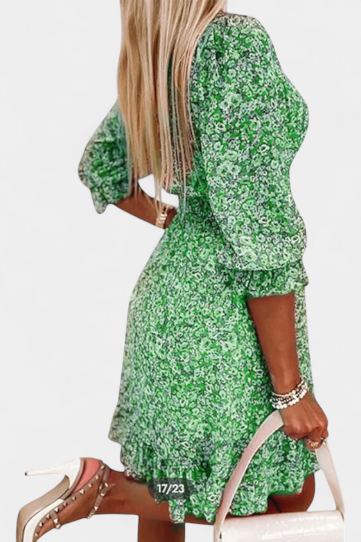 Robe Florale Benicia à Manches Bouffantes avec Ourlet Joueur