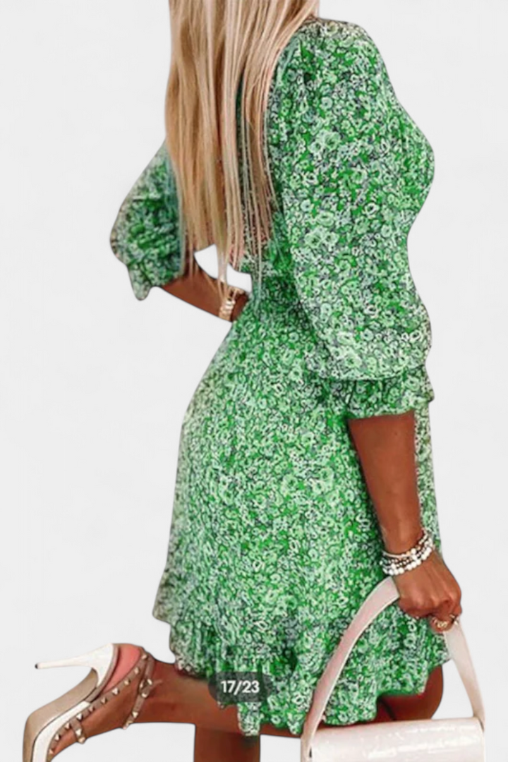 Robe Florale Benicia à Manches Bouffantes avec Ourlet Joueur