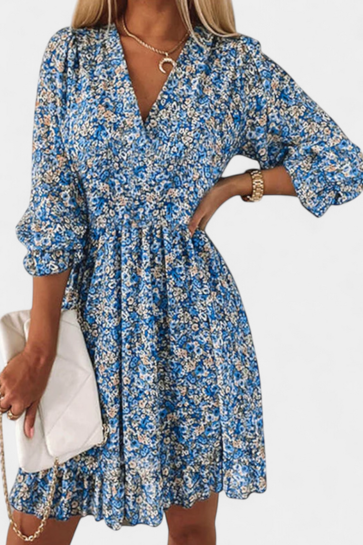 Robe Florale Benicia à Manches Bouffantes avec Ourlet Joueur