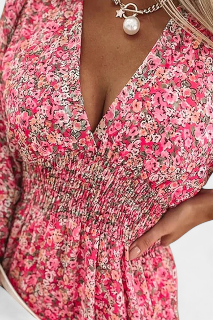 Robe Florale Benicia à Manches Bouffantes avec Ourlet Joueur
