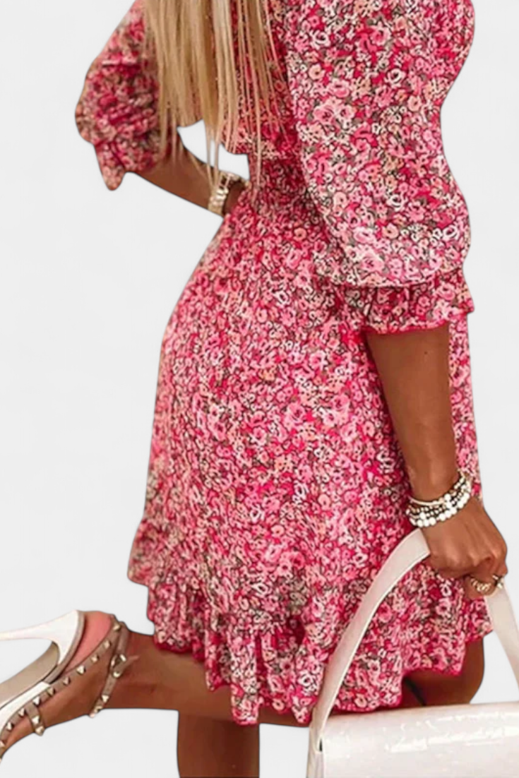 Robe Florale Benicia à Manches Bouffantes avec Ourlet Joueur