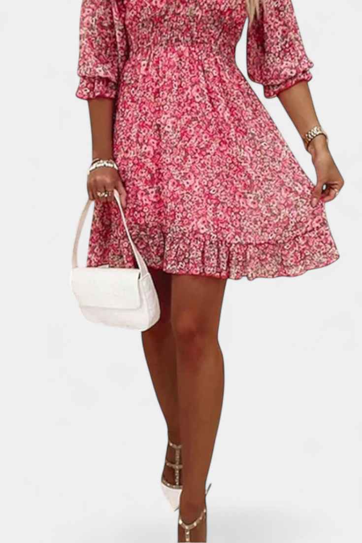 Robe Florale Benicia à Manches Bouffantes avec Ourlet Joueur