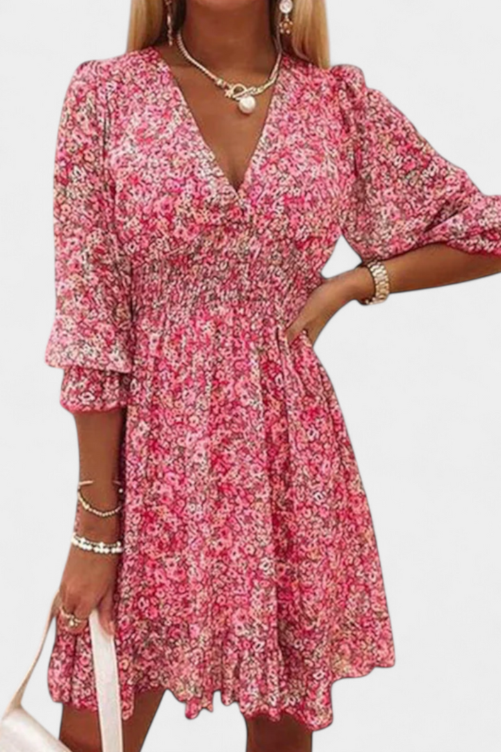 Robe Florale Benicia à Manches Bouffantes avec Ourlet Joueur