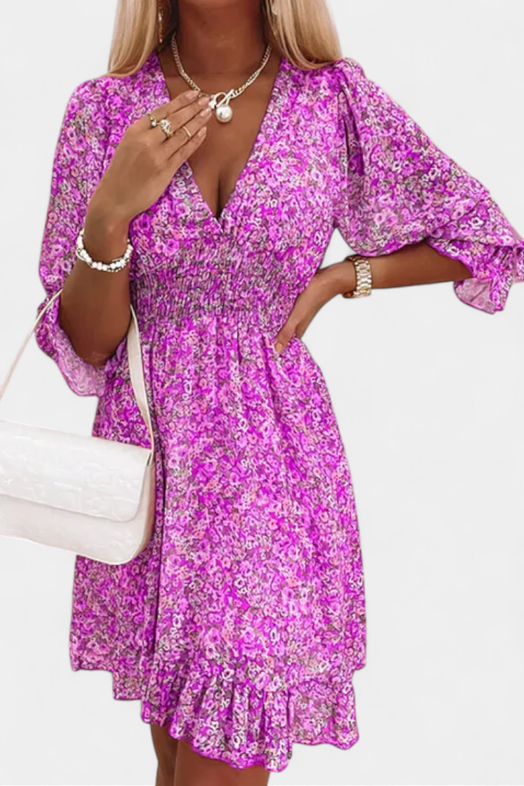Robe Florale Benicia à Manches Bouffantes avec Ourlet Joueur