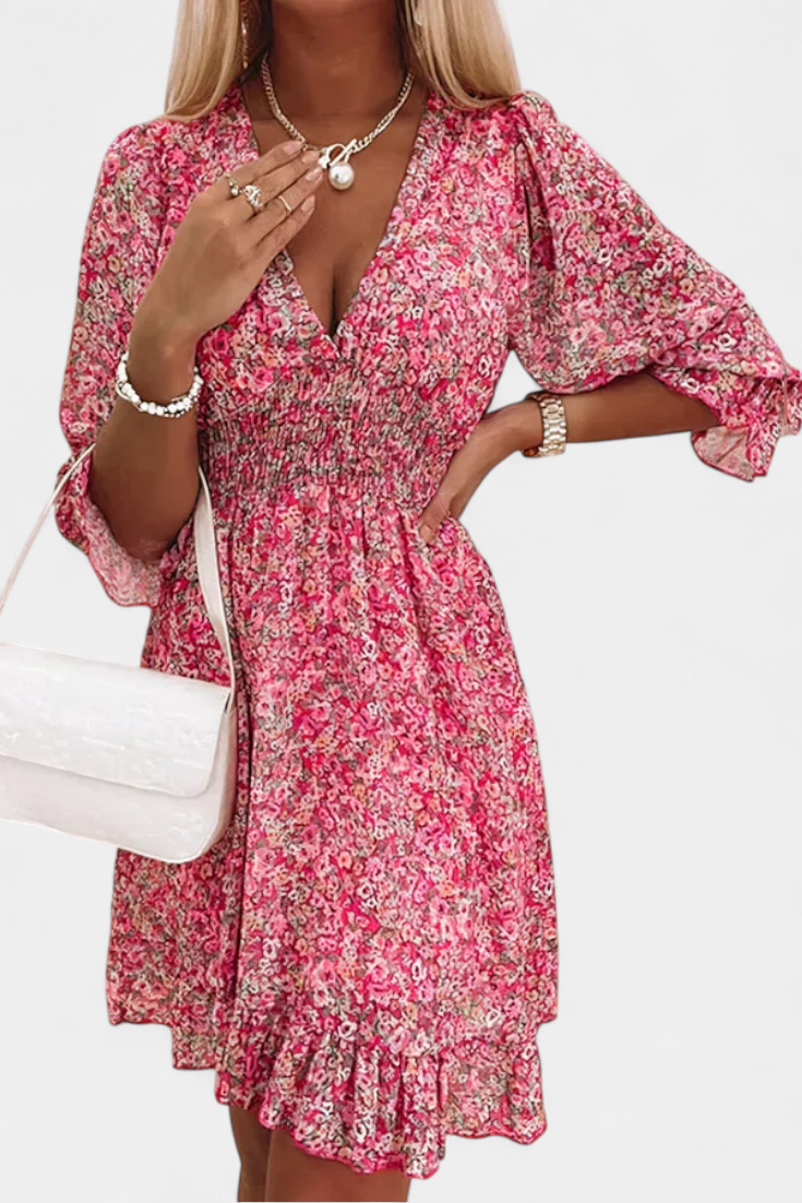 Robe Florale Benicia à Manches Bouffantes avec Ourlet Joueur