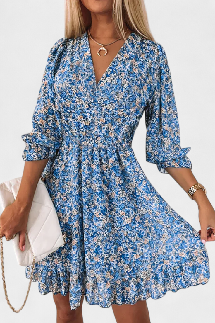 Robe Florale Benicia à Manches Bouffantes avec Ourlet Joueur